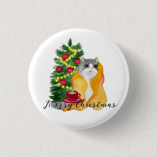 Cute cat under a cozy blanket with a cup of tea 1 inch round button