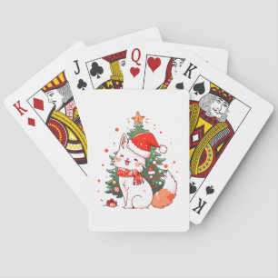 Cute cat wearing Santa hat near Christmas tree Playing Cards