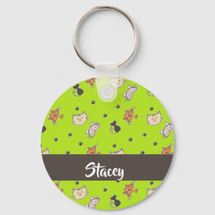 Cute cats on green keychain