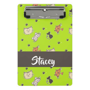 Cute cats on green mini clipboard