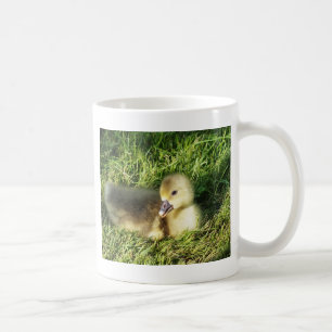 cute child in the grass geese coffee mug