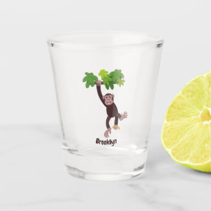 Cute chimpanzee in jungle hanging cartoon shot glass