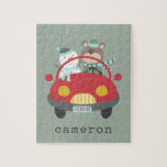Cute Christmas Bear Snowman Red Car Custom Name Jigsaw Puzzle<br><div class="desc">Delight in the holiday season with this cute and colourful custom puzzle, featuring a whimsical winter illustration of an adorable bear and snowman driving a red car. Personalize it with your name in a retro typewriter font to make it uniquely yours. This charming puzzle is a great gift idea for...</div>
