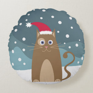 Cute christmas cat in snowy winter night round pillow