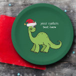 Cute Christmas Dinosaur Santa Custom Green Party Paper Plate<br><div class="desc">Awesome green dinosaur smiling and looking very cute in a holiday red Santa hat for Xmas. Kids will love this cool green holiday party paper plate. Customize this Christmas party decor with your own text in white.</div>