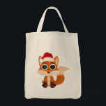 Cute Christmas Fox Cartoon Holiday Animal Festive  Tote Bag<br><div class="desc">Carry holiday joy on every shopping trip 🦊🎄 This adorable cartoon fox, with big expressive eyes and a cozy Santa hat, brings cute kawaii vibes, festive charm, and winter aesthetics to your everyday errands. Perfect for groceries, holiday shopping, or as a fun and practical gift, this tote spreads joy wherever...</div>