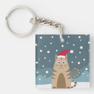 Cute christmas pet animal cat in snowy landscape keychain