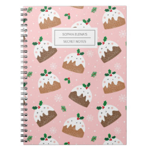 Cute christmas puddings on light pink notebook