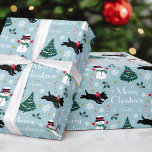 Cute Christmas Scottie Dog Snowman Blue Editable Wrapping Paper<br><div class="desc">Add a little whimsical charm to the holiday season with this cute Christmas gift wrap! An editable template, personalized with your family or the recipient's name. This seamless pattern features original artwork of a Scottie dog wearing a red bow, as he dashes along in the snow! There's a happy snowman...</div>