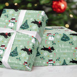 Cute Christmas Scottie Dog Snowman Green Editable Wrapping Paper<br><div class="desc">Add a little whimsical charm to the holiday season with this cute Christmas gift wrap! An editable template, personalized with your family or the recipient's name. This seamless pattern features original artwork of a Scottie dog wearing a red bow, as he dashes along in the snow! There's a happy snowman...</div>