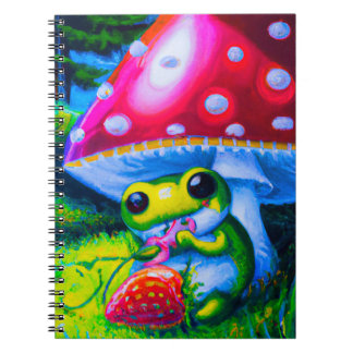 Cute chubby frog eating a strawberry notebook