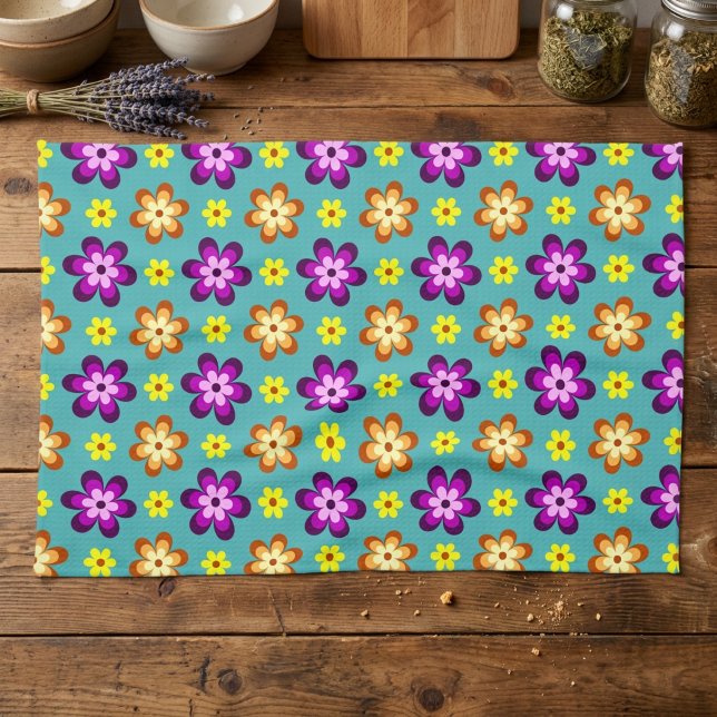 Cute Colourful Retro Flowers Kitchen Towel (Top down view of Cute Colorful Retro Flowers Kitchen Towel on a wooden cottagecore kitchen counter)