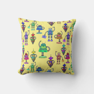 Cute colourful robots on yellow background throw pillow