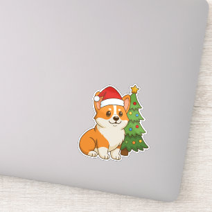 Cute Corgi Dog in a Red Hat with Christmas Tree
