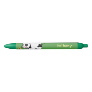Cute cow in green field cartoon illustration black ink pen