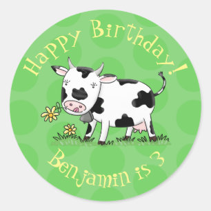Cute cow in green field cartoon illustration classic round sticker