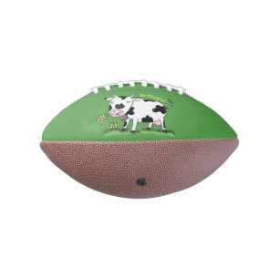 Cute cow in green field cartoon illustration football