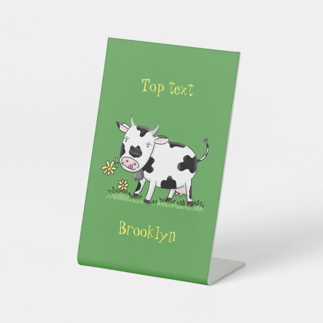 Cute cow in green field cartoon illustration pedestal sign (Front)