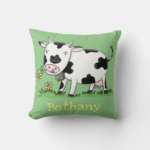 Cute cow in green field cartoon illustration throw pillow