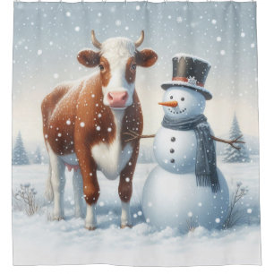 Cute cow & snowman in the winter field