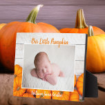 Cute Custom Fall Baby Pumpkin Newborn Photo Plaque<br><div class="desc">This beautiful,  modern Thanksgiving newborn photo plaque features a photograph of your sweet new baby under the words Our Little Pumpkin in orange. This pretty autumn photograph with trendy white wood behind the patch of pumpkins is an elegant birth gift for Halloween or Thanksgiving.</div>