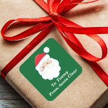 Cute Custom From Santa Claus Green Christmas Gift Square Sticker<br><div class="desc">Customize these cute Santa Claus gift labels with your own personalized text with your kids name in white script. Santa's red hat and white beard are the perfect holiday drawing on this festive green square gift sticker for your presents.</div>