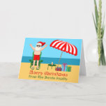 Cute Custom Sunny Beach Santa Claus Christmas Holiday Card<br><div class="desc">This cute custom sunny Christmas card makes the perfect postcard for warm weather at the pool or beach. Make it a fun north pole themed extravaganza with Santa Claus in his swimming trunks next to a red and white striped beach umbrella and gifts. I've never seen Mr. Klaus in a...</div>