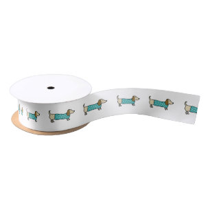 Cute dachshund in mint blue satin ribbon