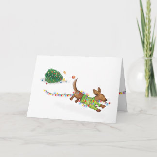 Cute dachshund with fairy lights Christmas card
