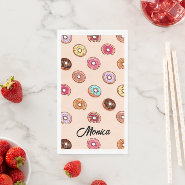 Cute decorative doughnuts on pink napkin (Insitu)