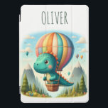 Cute Dinosaur Flying in a Hot Air Balloon iPad Pro Cover<br><div class="desc">Let your little explorer soar above the clouds with this personalized iPad cover featuring a charming dinosaur on a magical mountain adventure! Picture a vibrant hot air balloon drifting over majestic peaks, creating a whimsical scene. It's also uniquely personalized with your child's name, making it a cherished keepsake for years...</div>