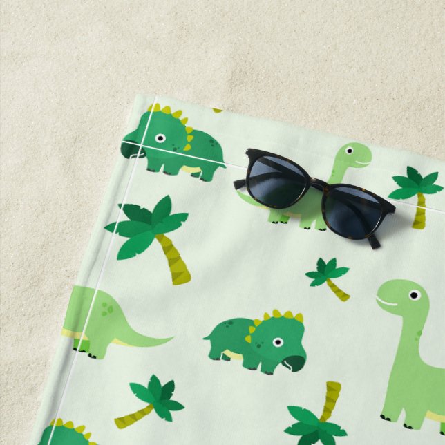 Cute Dinosaur Pattern on White Beach Towel (In Situ)