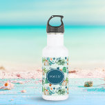 Cute Dinosaur T Rex Triceratops Kids  532 Ml Water Bottle<br><div class="desc">Cool,  personalized dinosaur water bottle features a pattern of cute Tyrannosaurus (T rex),  Triceratops,  tropical monstera leaves,  palm trees,  volcano,  bones,  and "Roar!" text on a light blue background. Perfect for dino loving kids,  back to school,  sports and summer fun. Original artwork KL Stock</div>