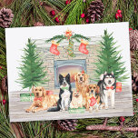 Cute Dog Lover Puppy Christmas Fireplace Scene Holiday Postcard<br><div class="desc">Send christmas greetings this holiday season with this dog breeds in a watercolor design. This dog lovers holiday card features dogs, yellow labrador retriever, border collie, golden retriever, pomeranian, beagle and a husky malamute, a fireplace scene with holiday trees, stockings and presents. Personalize with family name. This animal lover christmas...</div>