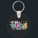 Cute Easter Nurse Medical Humor Keychain<br><div class="desc">Colorful lettering with a nurse hat,  stethoscope,  flowers and playful medical symbols. A cheerful graphic celebrating caring nurses and healthcare professionals during the Easter season with a bright and friendly hospital atmosphere.</div>