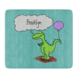 Cute fire breathing green funny dragon cartoon cutting board
