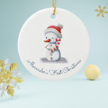 Cute First Christmas Snowman Ceramic Ornament<br><div class="desc">What better way to celebrate your little one's first Christmas than by giving them a spot on the Christmas tree? This adorable ceramic ornament, featuring a little snowman in a red Santa hat and clutching a big candy cane, can be personalized with your own text to make it truly one-of-a-kind....</div>