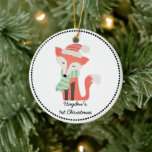 Cute Fox Baby's Christmas Winter Woodland Rustic Ceramic Ornament<br><div class="desc">This cute fox Christmas Winter Woodland design features a rustic illustration of a red fox wearing a scarf and red hat. Personalize with your child's name, date or text of your choice. Perfect for a baby's first or christmas gift for any young child. Customize the background door to match room...</div>