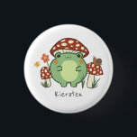 Cute Frog and Mushrooms Cartoon   1 Inch Round Button<br><div class="desc">This cute, personalized button pin features a hand-drawn kawaii style cartoon frog, wearing a mushroom hat, along with other mushrooms, a snail, a flower, a butterfly, and grass. A colour scheme of red, lime, green, brown, orange, yellow, and peach is perfect for either the Indie or Cottage Core Aesthetic lover....</div>