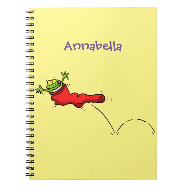Cute frog in a red sock jumping cartoon notebook (Front)