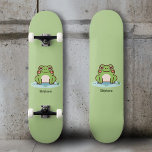 Cute Frog Skateboard<br><div class="desc">A green skateboard with an illustration of a cute frog on its pond and customizable text below: a perfect gift for a kid! You could also use them for home decoration or to have fun during your skate sessions!</div>