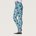 Cute Fun Black on Blue Paw Print Leggings<br><div class="desc">These fun leggings are perfect for dog and cat lovers. They feature a cute pattern with black paw prints scattered over a light blue background. Fun whimsical design is perfect for pet parents and animal lovers.</div>