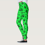 Cute Fun Black on Neon Green Paw Prints Leggings<br><div class="desc">These fun leggings are perfect for dog and cat lovers. They feature a cute pattern with black paw prints scattered over a bright neon green coloured background. Fun whimsical design is perfect for pet parents and animal lovers.</div>