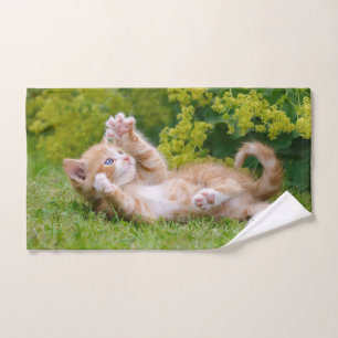 Cute funny cat kitten playing in a flowery garden bath towel set