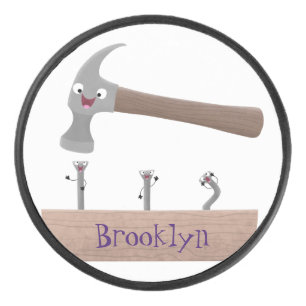 Cute, funny hammer and nails cartoon illustration hockey puck