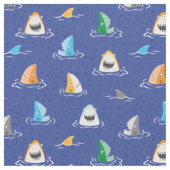 Cute funny sharks and fins on blue fabric (Close Up)