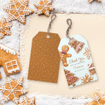 Cute Gingerbread Man Baby Shower Thank You Gift Tags<br><div class="desc">Add a touch of sweetness to your baby shower favours with our charming gift tag. Featuring "Thank you" in graceful script,  it is accompanied by a whimsical watercolor gingerbread man,  snowflakes,  and festive elements on a pastel blue background. Perfect for your Christmas or winter baby shower favours.</div>