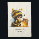 Cute Girl in Bee Costume with Honey Kitchen Towel<br><div class="desc">A kitchen towel with a cute image. A girl in a crocheted bee costume with a bee by her side. Watching over a jar of honey.</div>