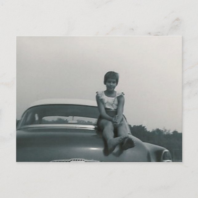 cute girl sitting on back of old car post card (Front)