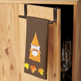 Cute Gnome and Autumn Leaves on Brown Kitchen Towel